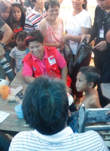 Secretary Corazon "Dinky" Soliman was flocked by people during her visit at Estancia, Iloilo