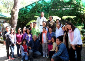 DSWD Secretary Corazon "Dinky" Soliman poses with DSWD-CAR Regional Director Leonardo Reynoso and the Community Driven Development Project staff of the Cordilleras during her visit last December 2013.